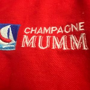Red Polo shirt with Mumm Champagne Logo